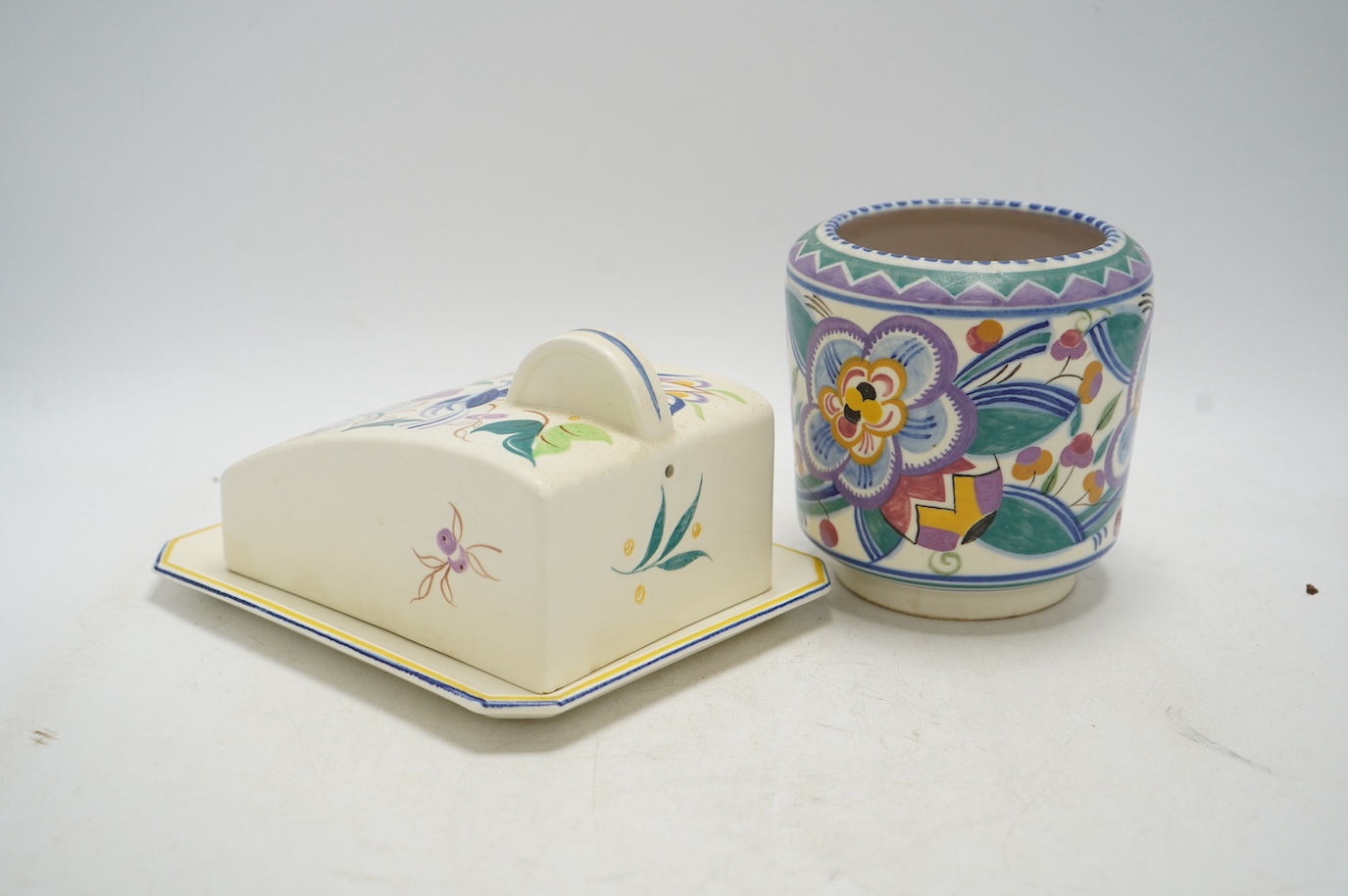 An early Poole pottery vase and a cheese dish and cover, vase 12cm tall. Condition - fair to good